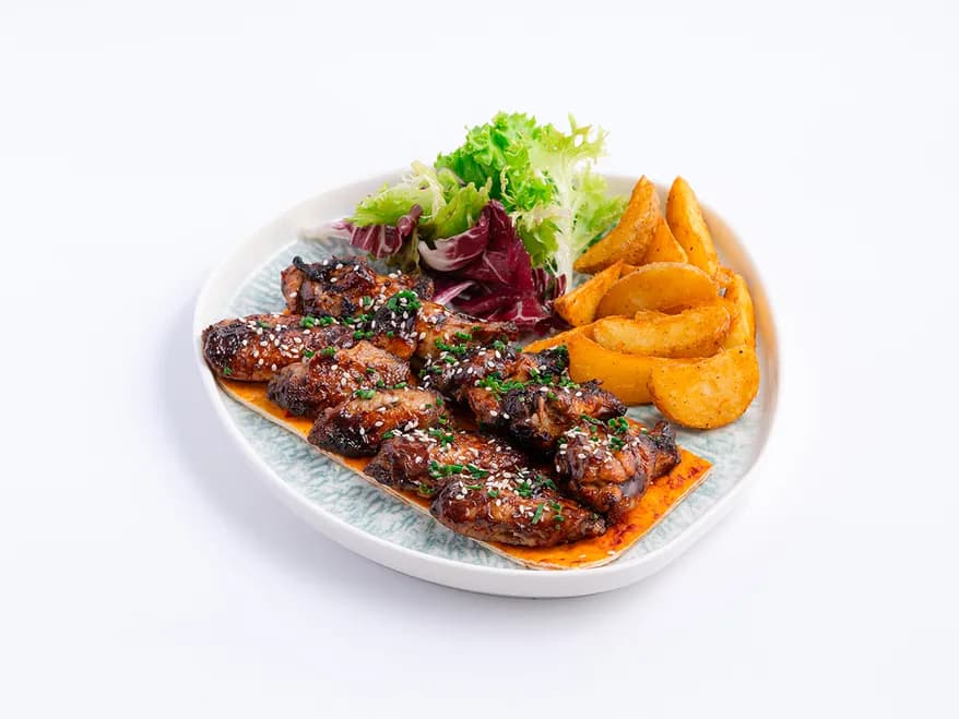 أجنحة دجاج مشوية at Aram Restaurant